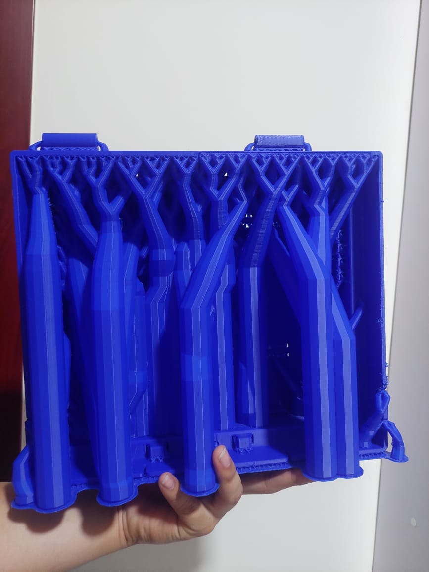 Freshly printed piece with its print supports