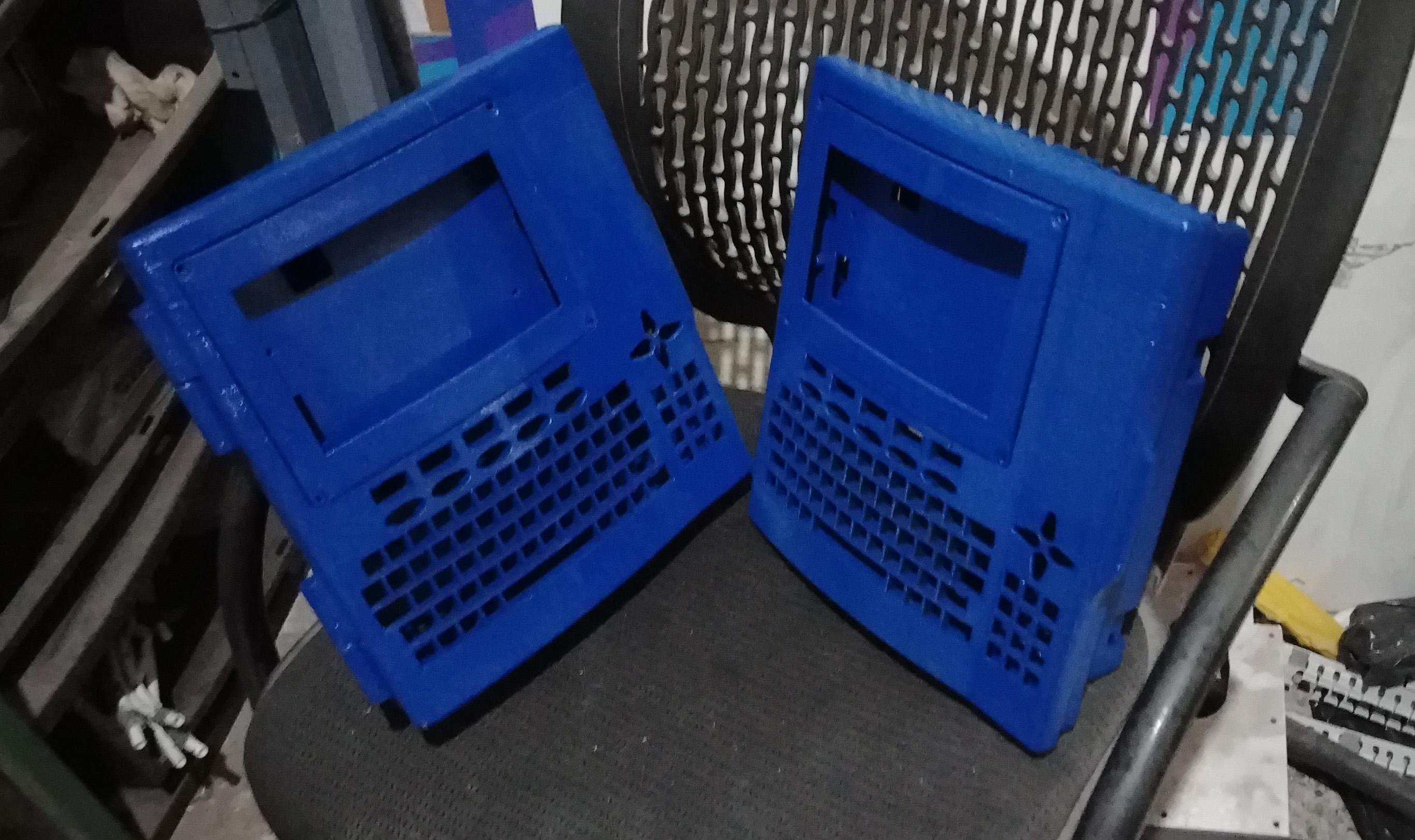 Two printed enclosures from the production run