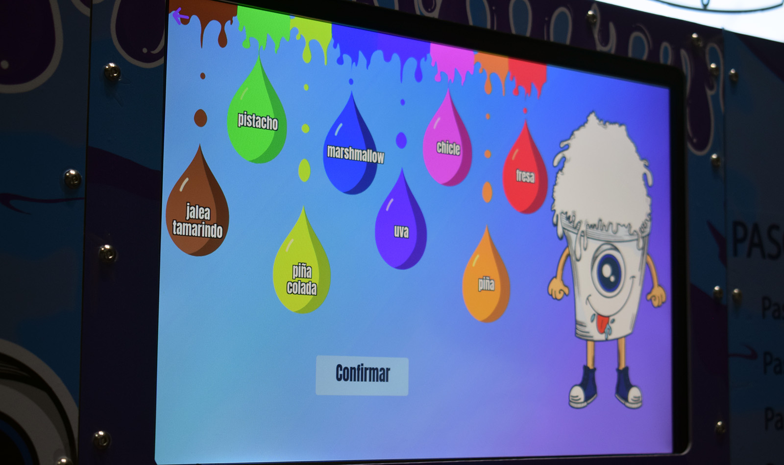 The machine's flavor-selection touchscreen